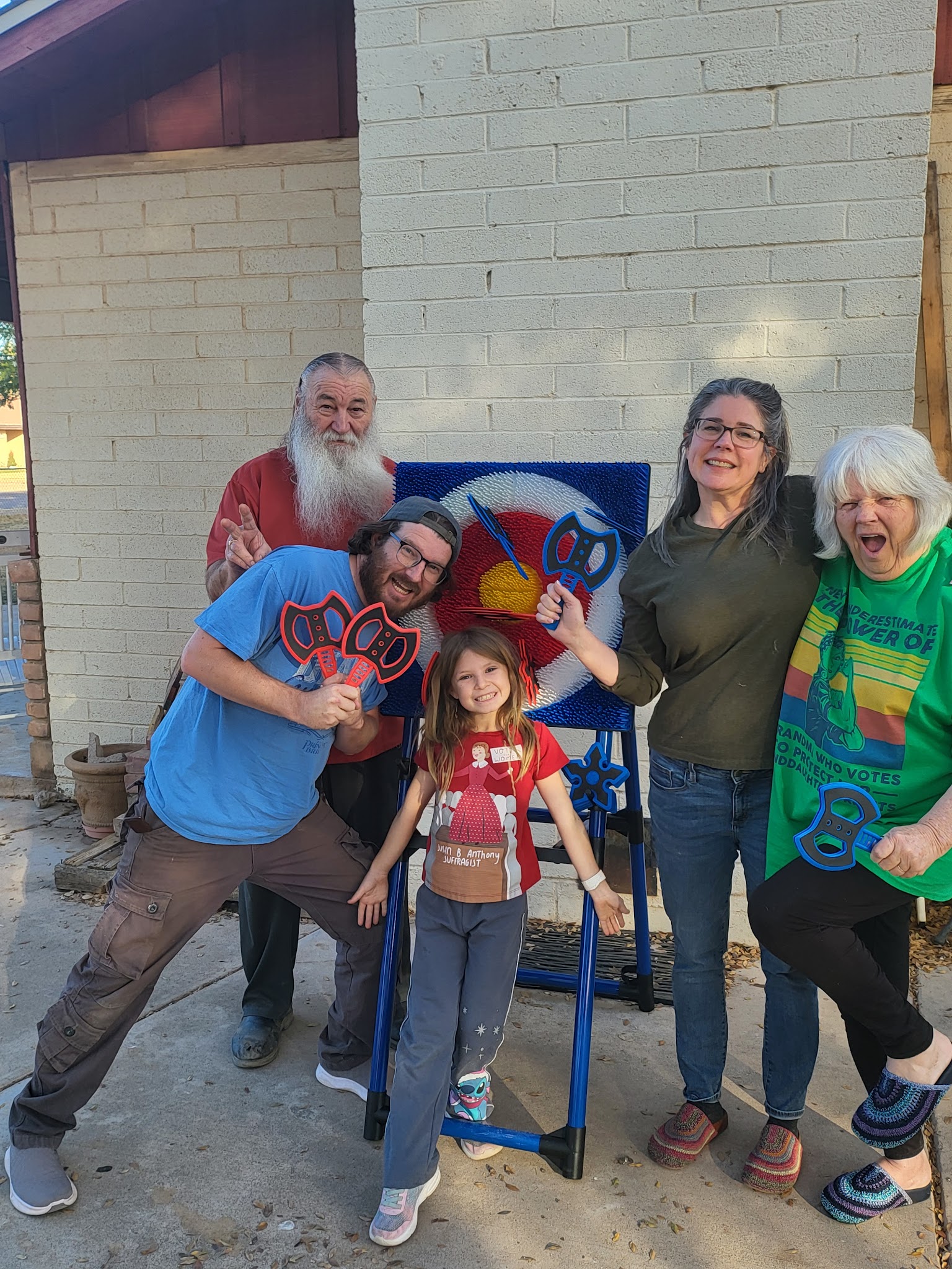 Papaw with a peace sign, James, Heartley, and Mamaw